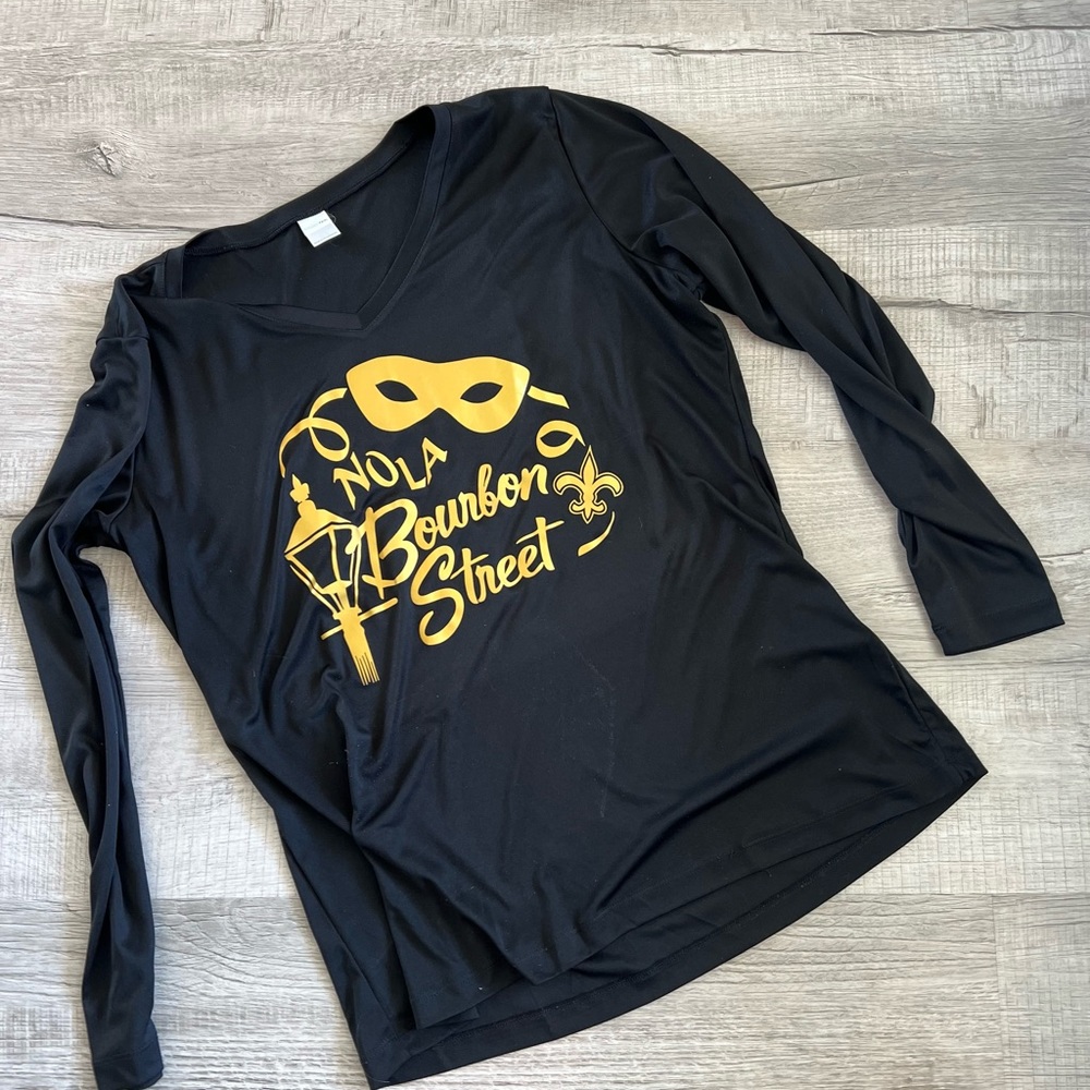 NOLA design. Sport-tek, Dri fit. Women’s cut.